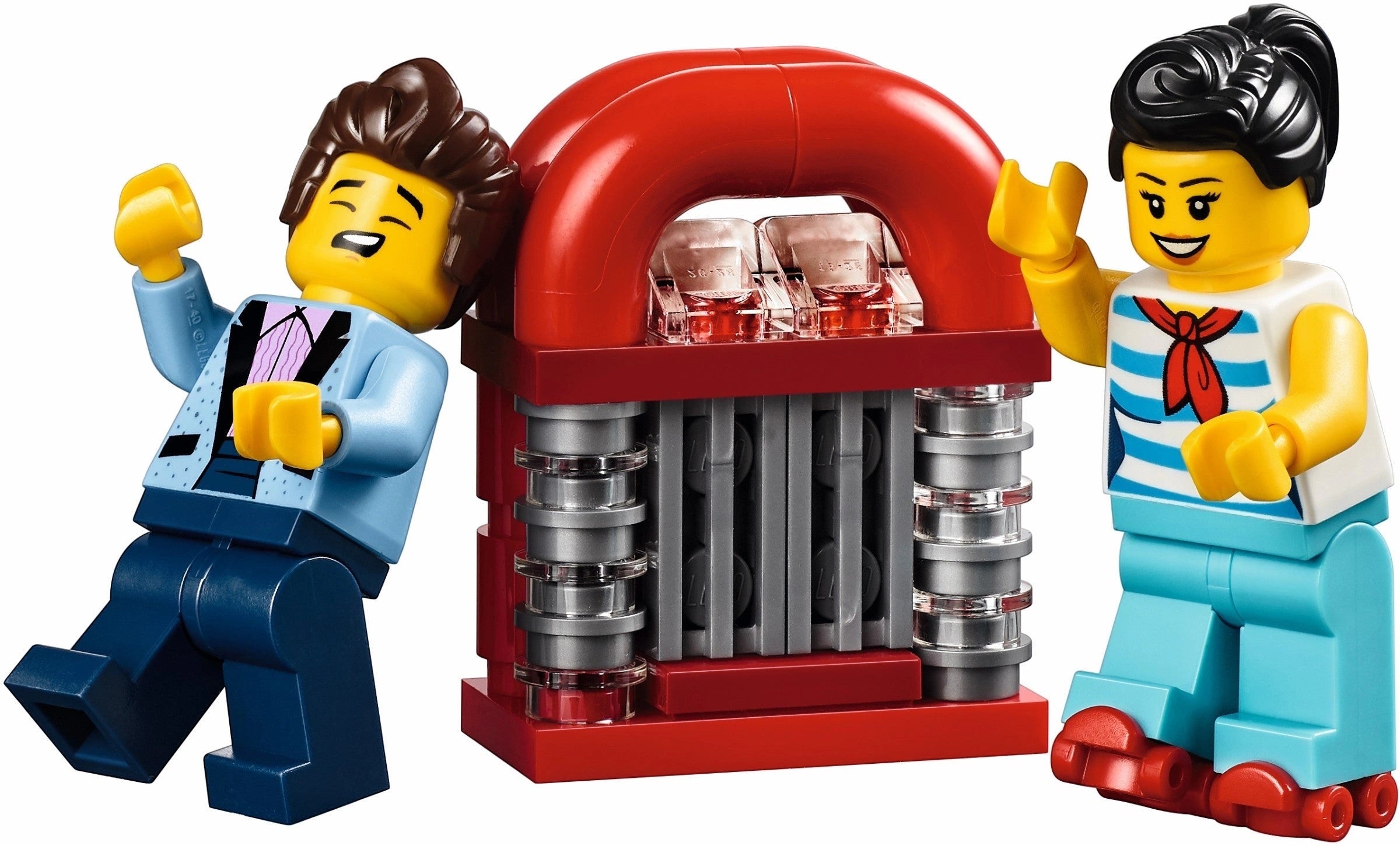 Two LEGO figures with a red jukebox on a white background