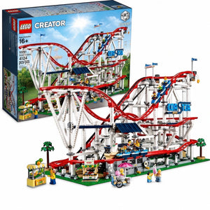 LEGO Creator roller coaster set shown with its retail box on a white background. The assembled model features a complex red and white roller coaster with blue accents, a green base, and several small minifigures and stalls.