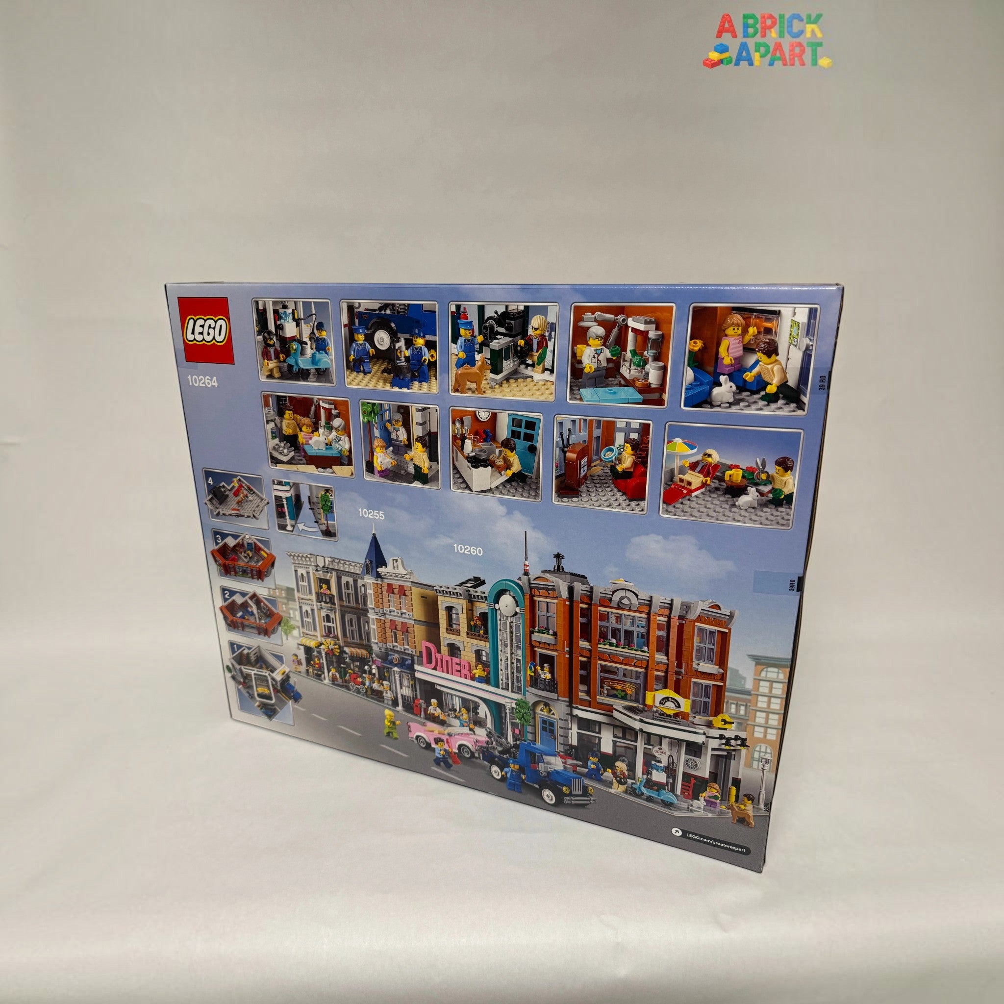 LEGO set box with various minifigure images and a city street scene on a white background