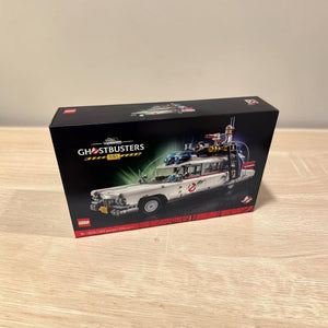 [lifestyle-shelf-box] LEGO Ghostbusters Ecto-1 box on a wooden shelf