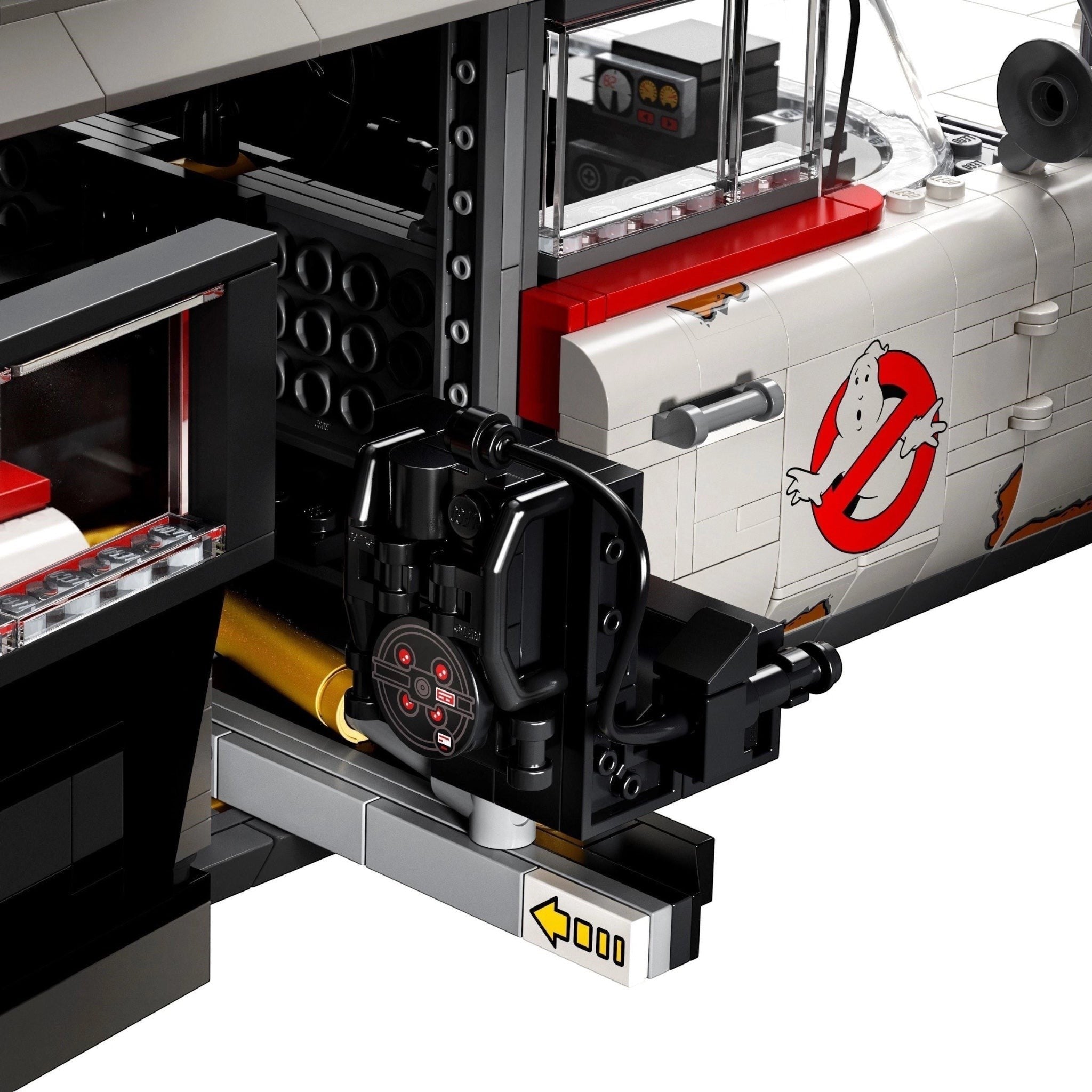 Close-up of a LEGO model with a detailed engine and Ghostbusters logo on a white background