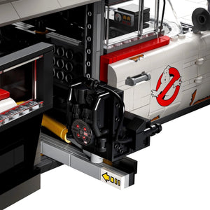 Close-up of a LEGO model with a detailed engine and Ghostbusters logo on a white background