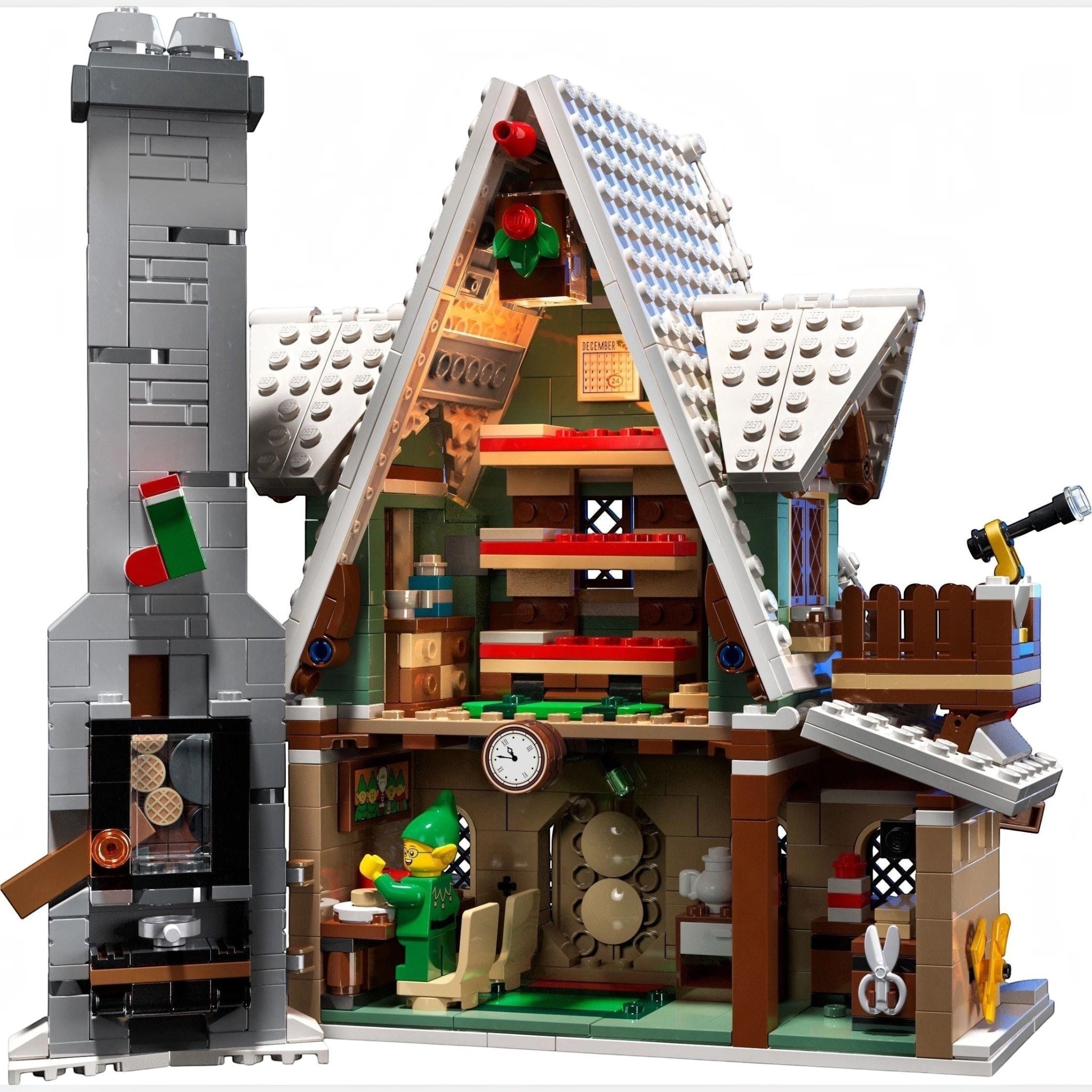 Toy house model with detailed interior and characters on a white background
