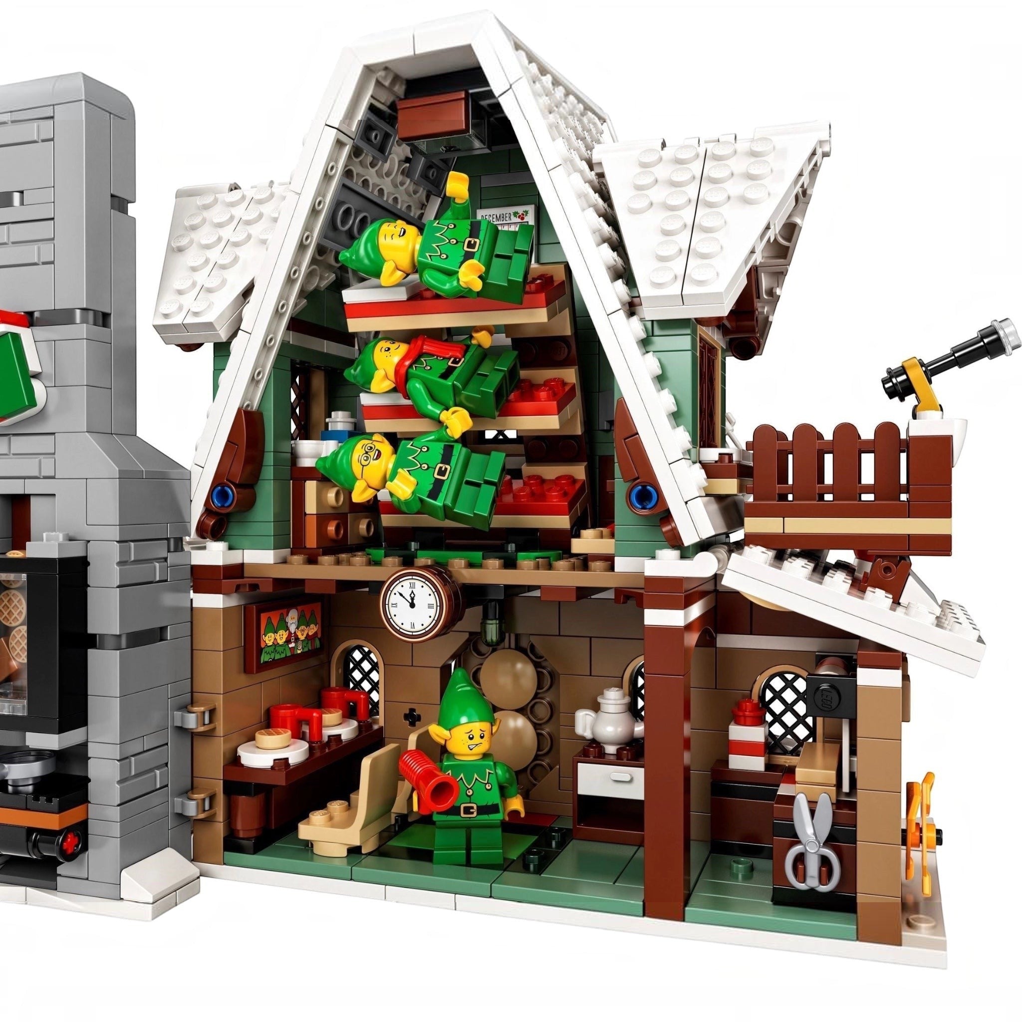 Detailed LEGO model of a house interior with various elements and furniture.