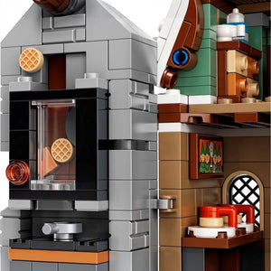 LEGO model of a coffee shop with a waffle and coffee setup.