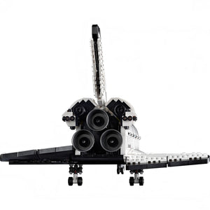 Model of a rocket ship with a white background