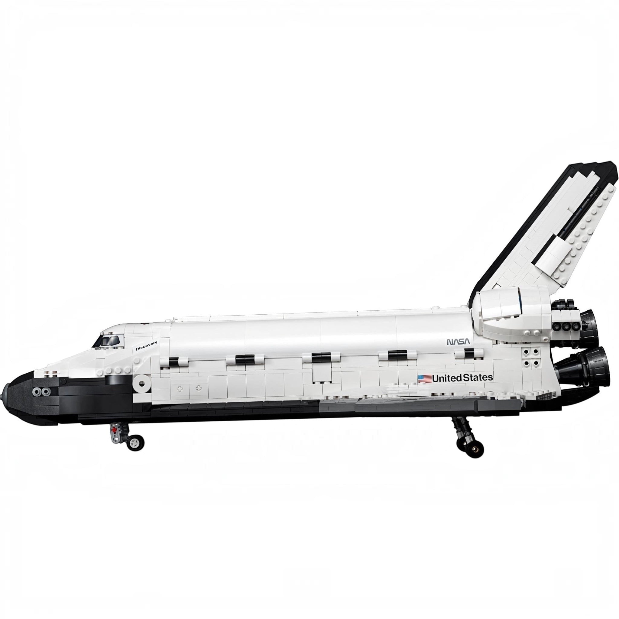 Model of a space shuttle with NASA branding on a white background