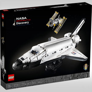 LEGO NASA Space Shuttle Discovery set packaging on a black background