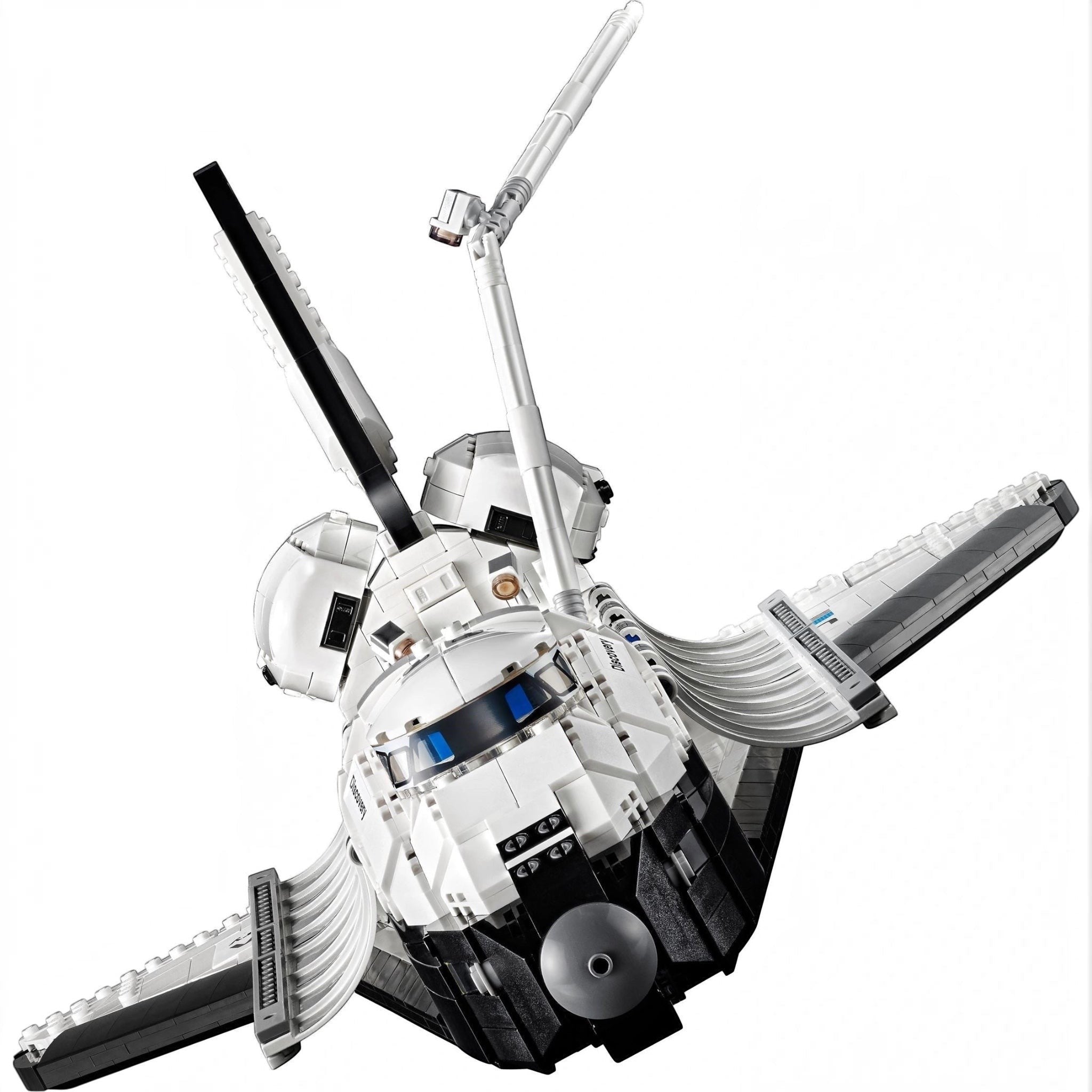 Model of a space shuttle made from interlocking bricks on a white background