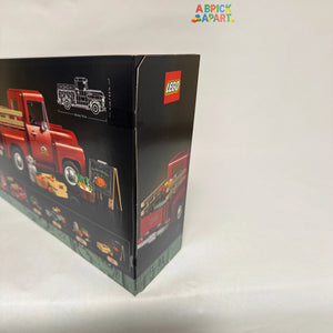 LEGO truck set packaging with red truck illustration on a white background