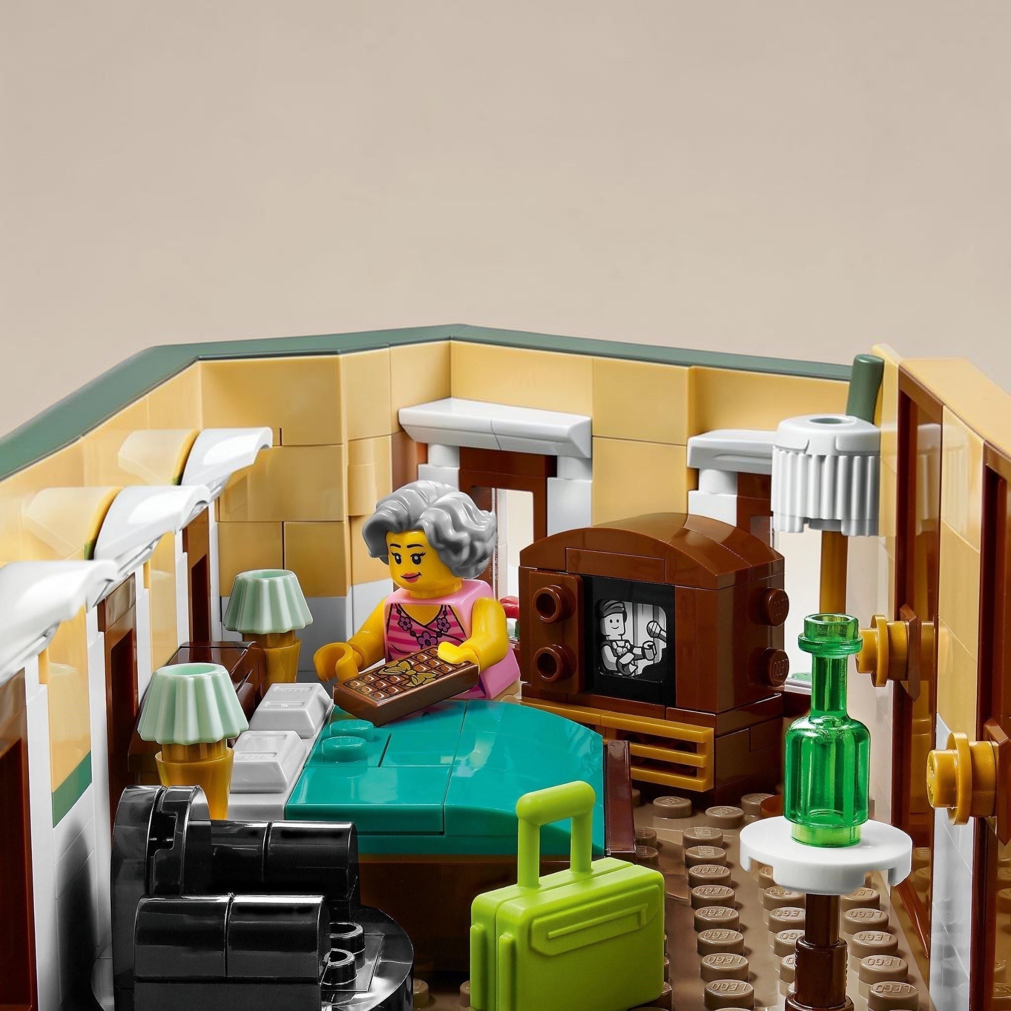 LEGO set of a living room with furniture and a TV.