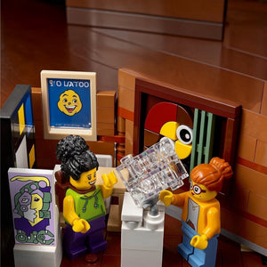Two LEGO figures interacting with a transparent object in a room setting.