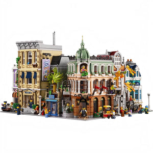 Detailed LEGO model of a city street with various buildings and figures.