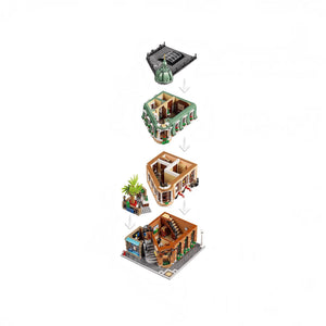 Set of building blocks arranged to resemble a city street with various structures.