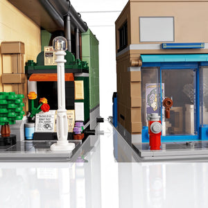 Close-up of a LEGO model with a fire hydrant and store front