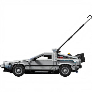 Model of a car resembling the DeLorean from Back to the Future made from interlocking bricks on a white background.