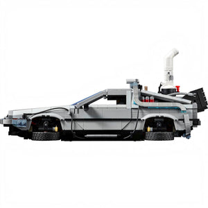 Model of a futuristic vehicle made from interlocking bricks on a white background