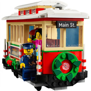 LEGO trolley with characters and 'Main St.' sign on a white background