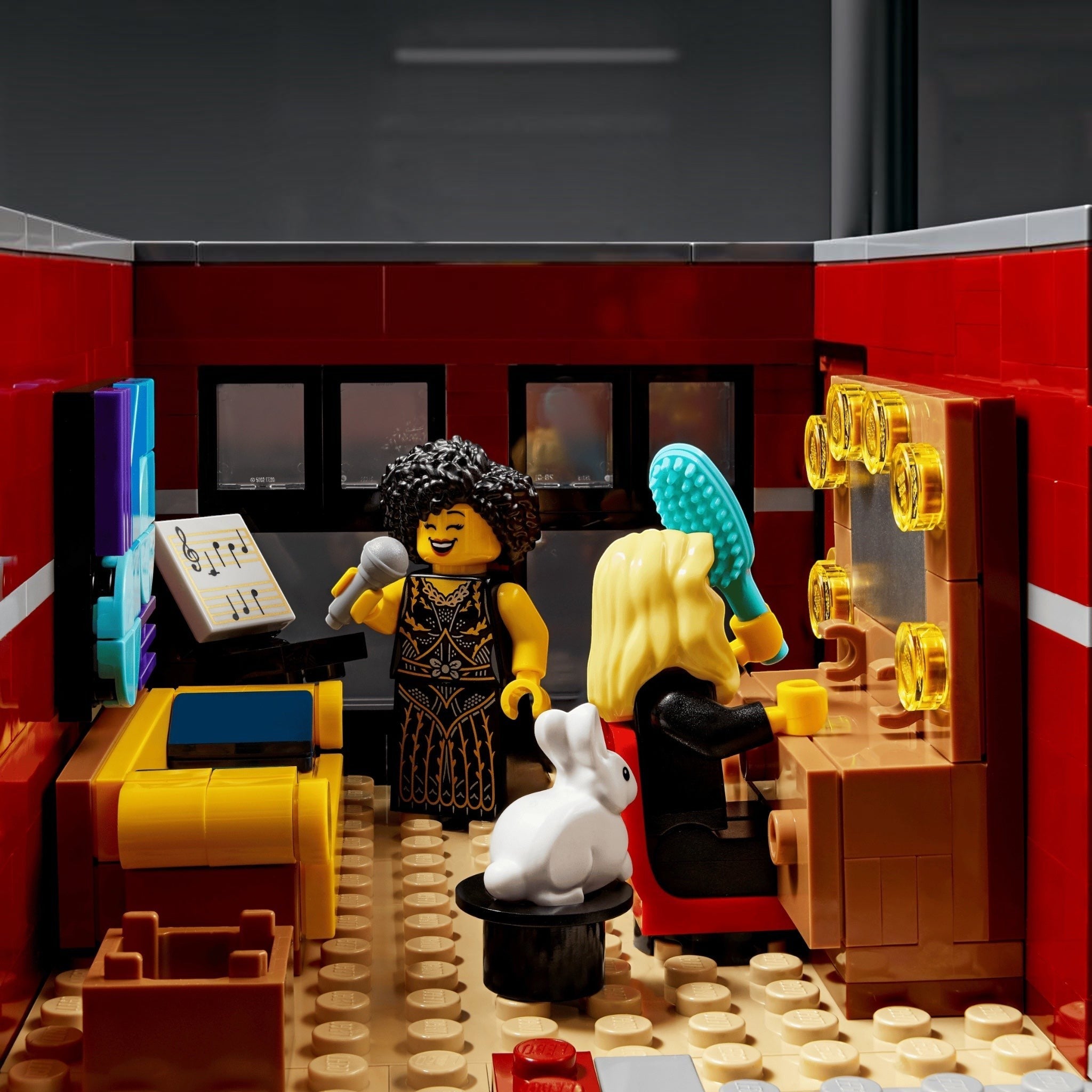 LEGO scene with characters in a room with furniture and decor