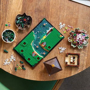 Toy building set on a wooden table with various components.