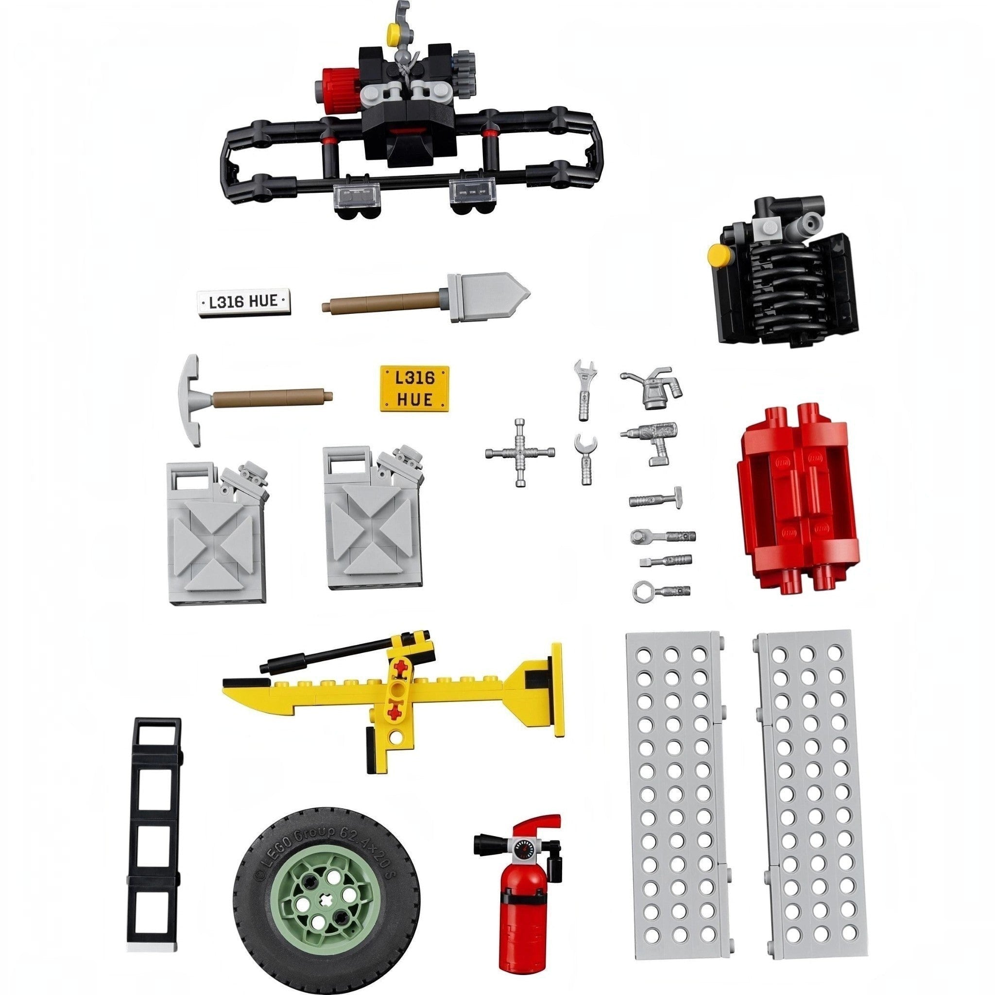 Collection of various toy building blocks and components on a white background