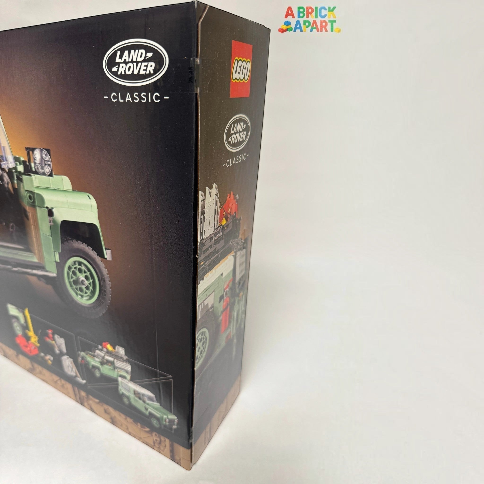 Land Rover and LEGO box with model illustration on a white background