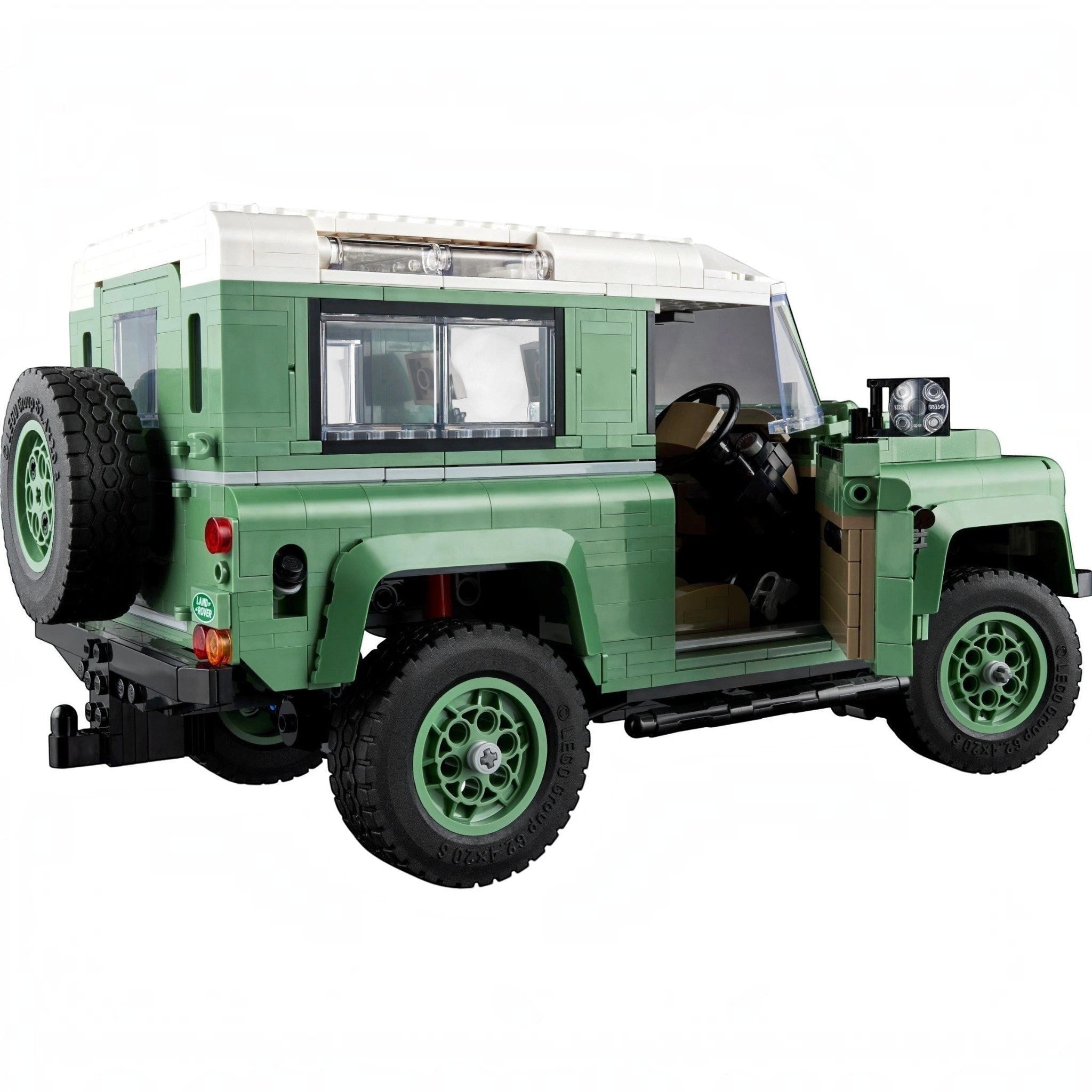 Green toy SUV with open door on a white background