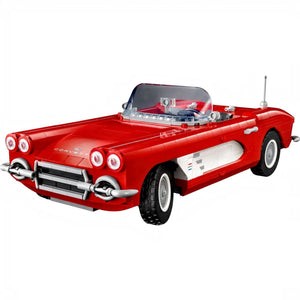 Red vintage car model on a white background