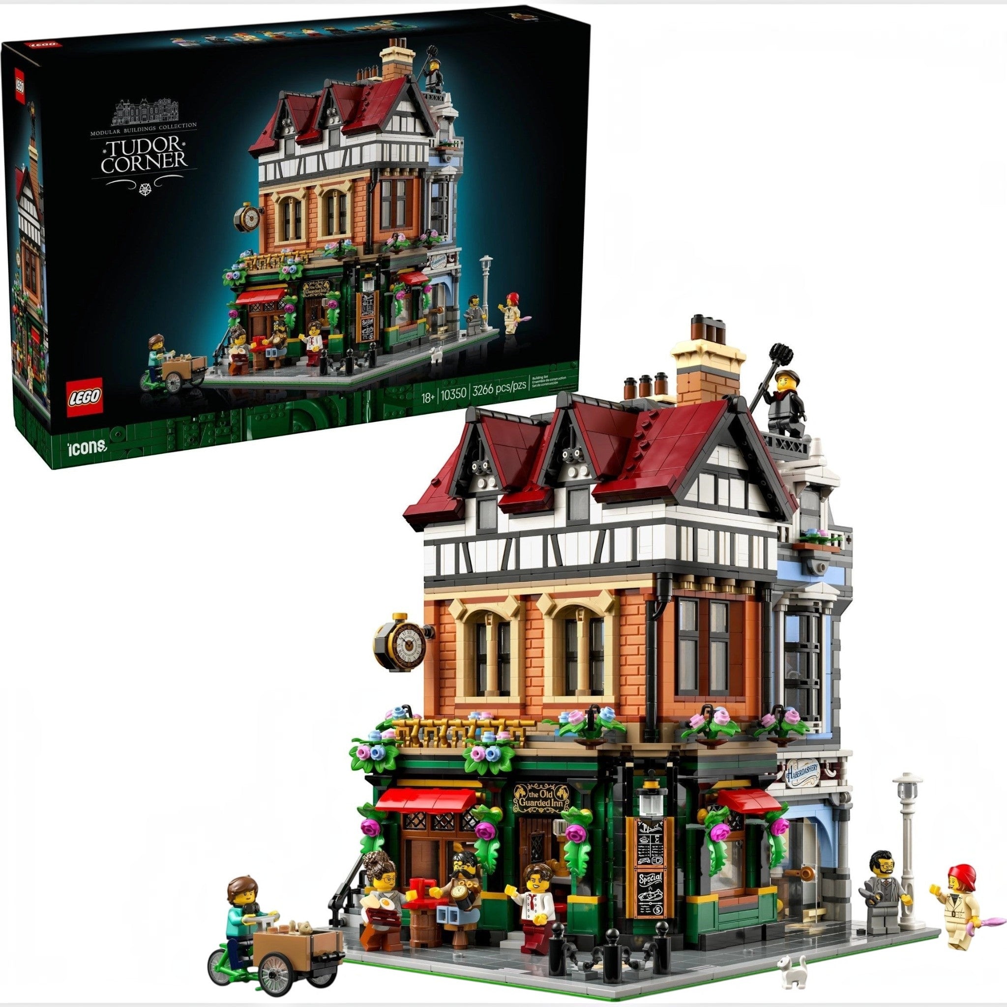 LEGO building set with detailed architecture and people figures, next to its packaging.