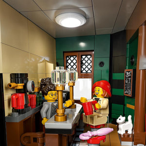 Two LEGO figures in a bar setting with a bartender and a customer.