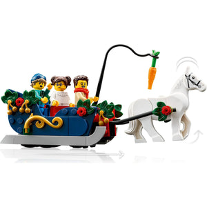 [minifig] A LEGO holiday sleigh set with a white horse pull, decorated with green leaves and red flowers, carrying three LEGO minifigures on a white background.