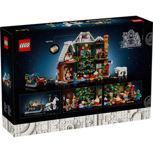 [box-back] LEGO Christmas Village Advent House building set box, showing the assembled festive house with a decorated tree, minifigures, a sleigh, and a white bear on a dark starry background.