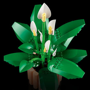 [built-detail] LEGO model of a potted plant with green leaves and white flowers on a black background