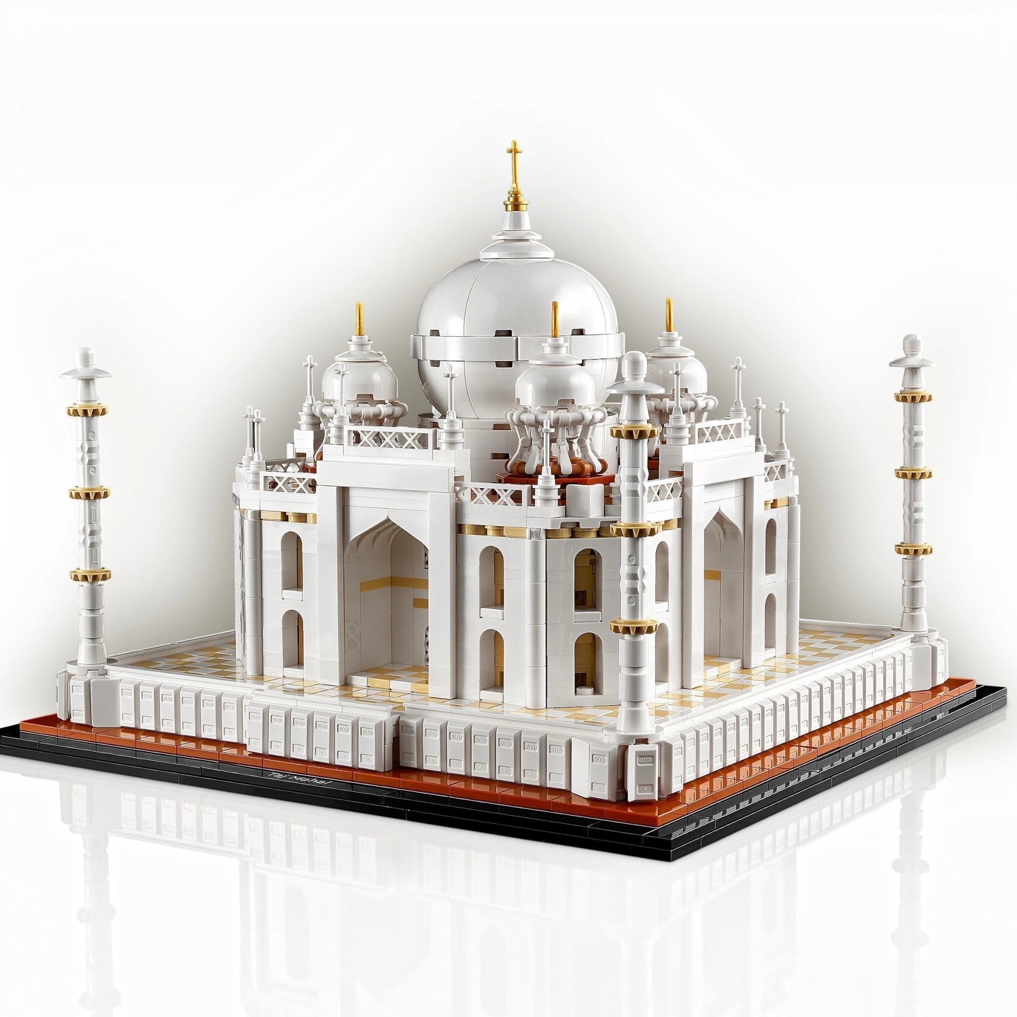 Model of the Taj Mahal made from interlocking bricks on a white background