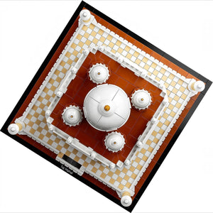 Model of a spacecraft on a checkered surface with a white background