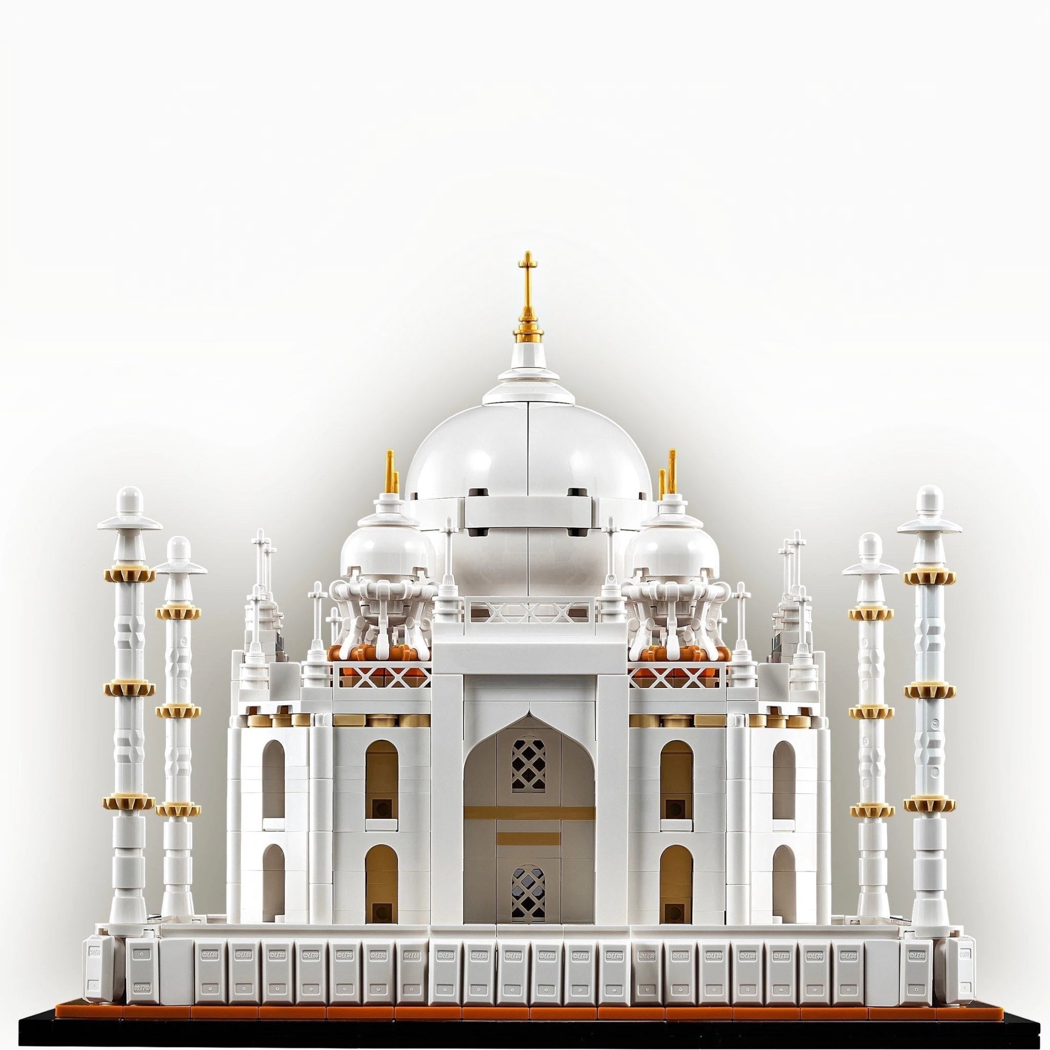 Model of the Taj Mahal made from interlocking bricks on a white background