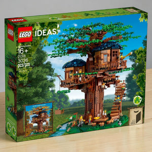 [lifestyle-shelf-box] LEGO Ideas Tree House set packaging with treehouse illustration on a green box