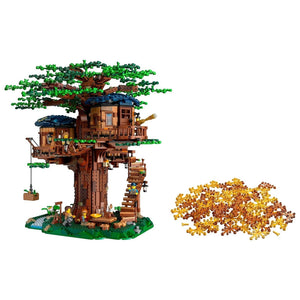 [built-detail] Treehouse model with greenery and a small pile of gold coins on a white background