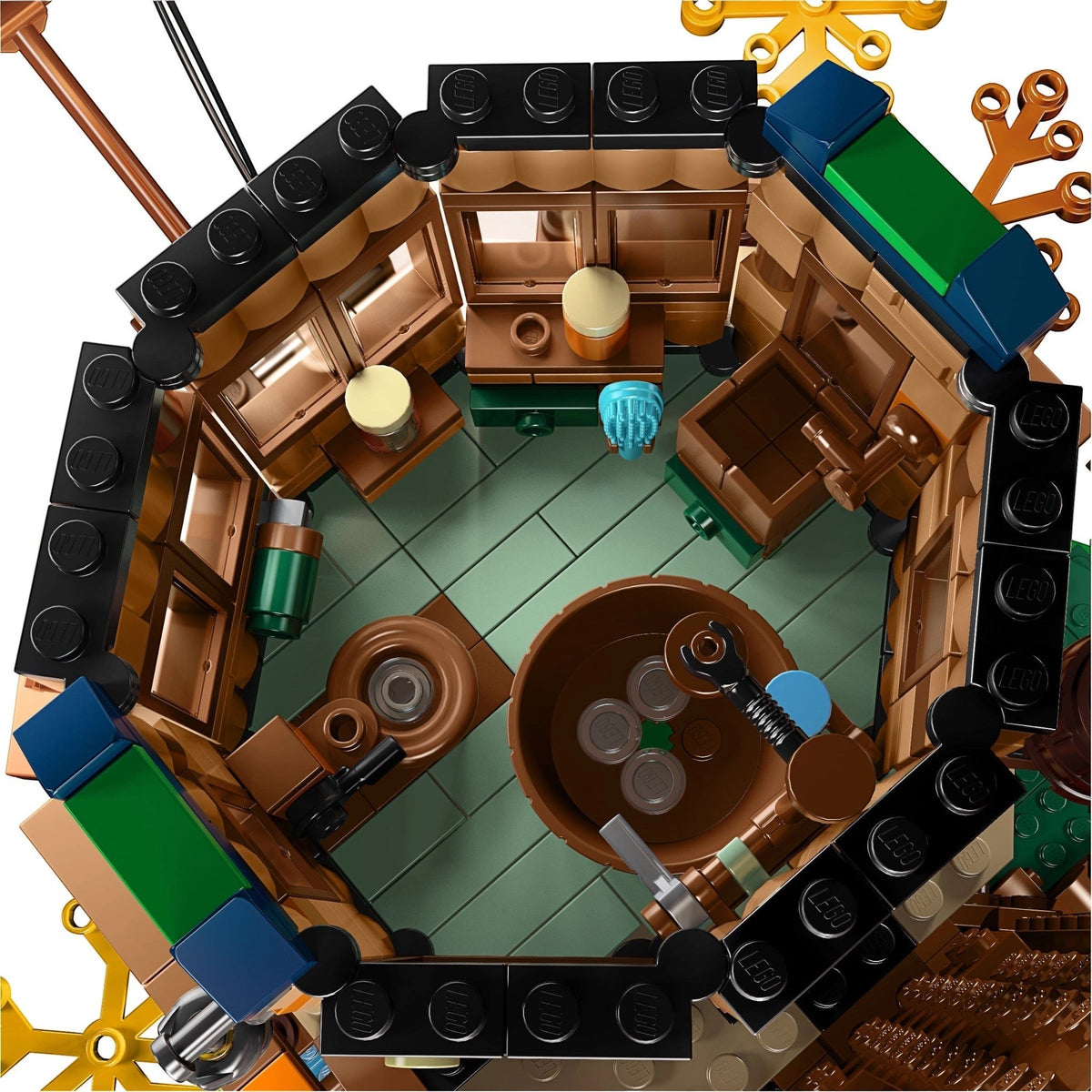 [built-detail] Top-down view of a LEGO model of a bar with various elements.