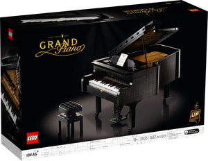 [box-front] A Brick Apart LEGO Ideas Grand Piano set box featuring a black brick-built concert piano and adjustable bench on white background.