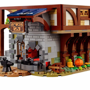 [built-detail] Close-up of a LEGO fireplace with detailed brickwork and accessories.