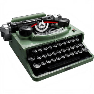 Green typewriter with visible mechanism on a white background