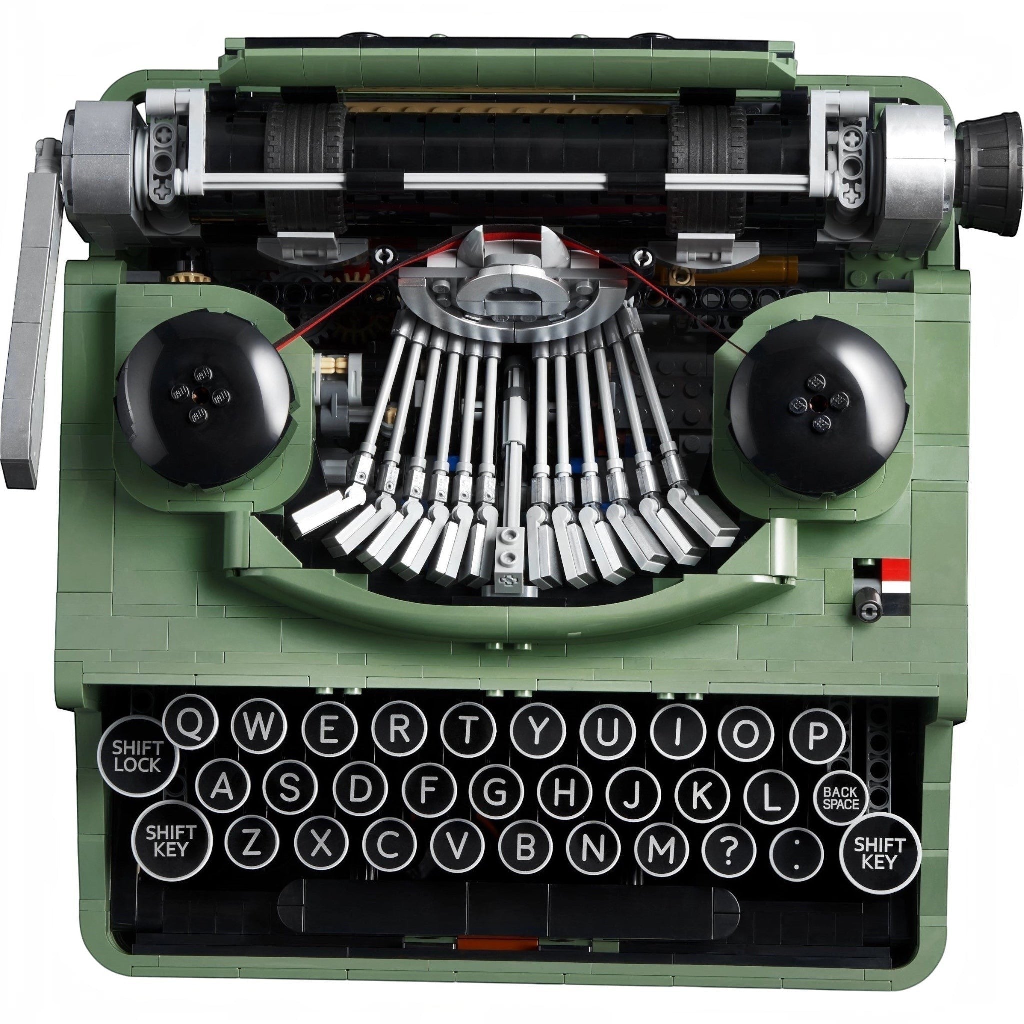 Green typewriter model with intricate mechanical details on a white background