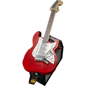 Red and white electric guitar made of interlocking bricks on a white background