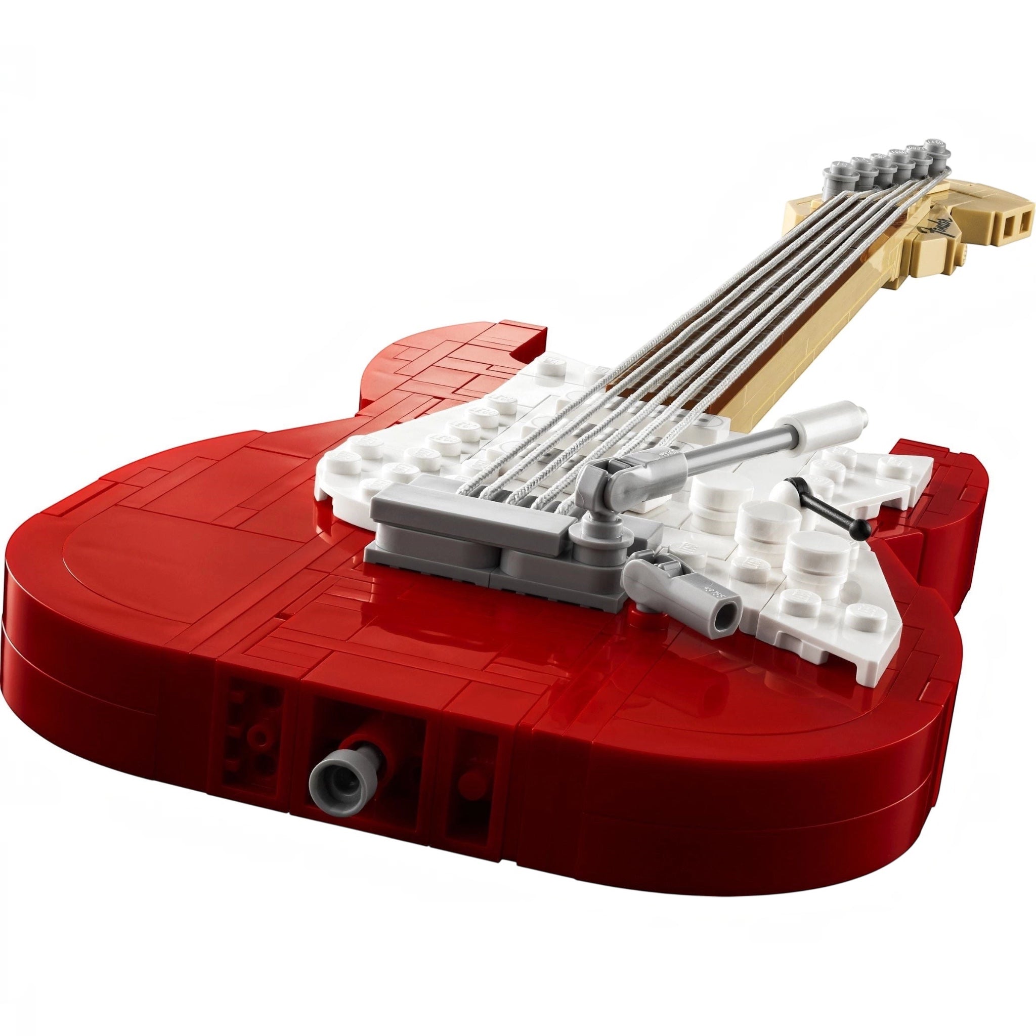 Red guitar model made of interlocking bricks on a white background