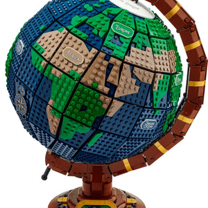 Model of a globe made from interlocking bricks on a transparent background