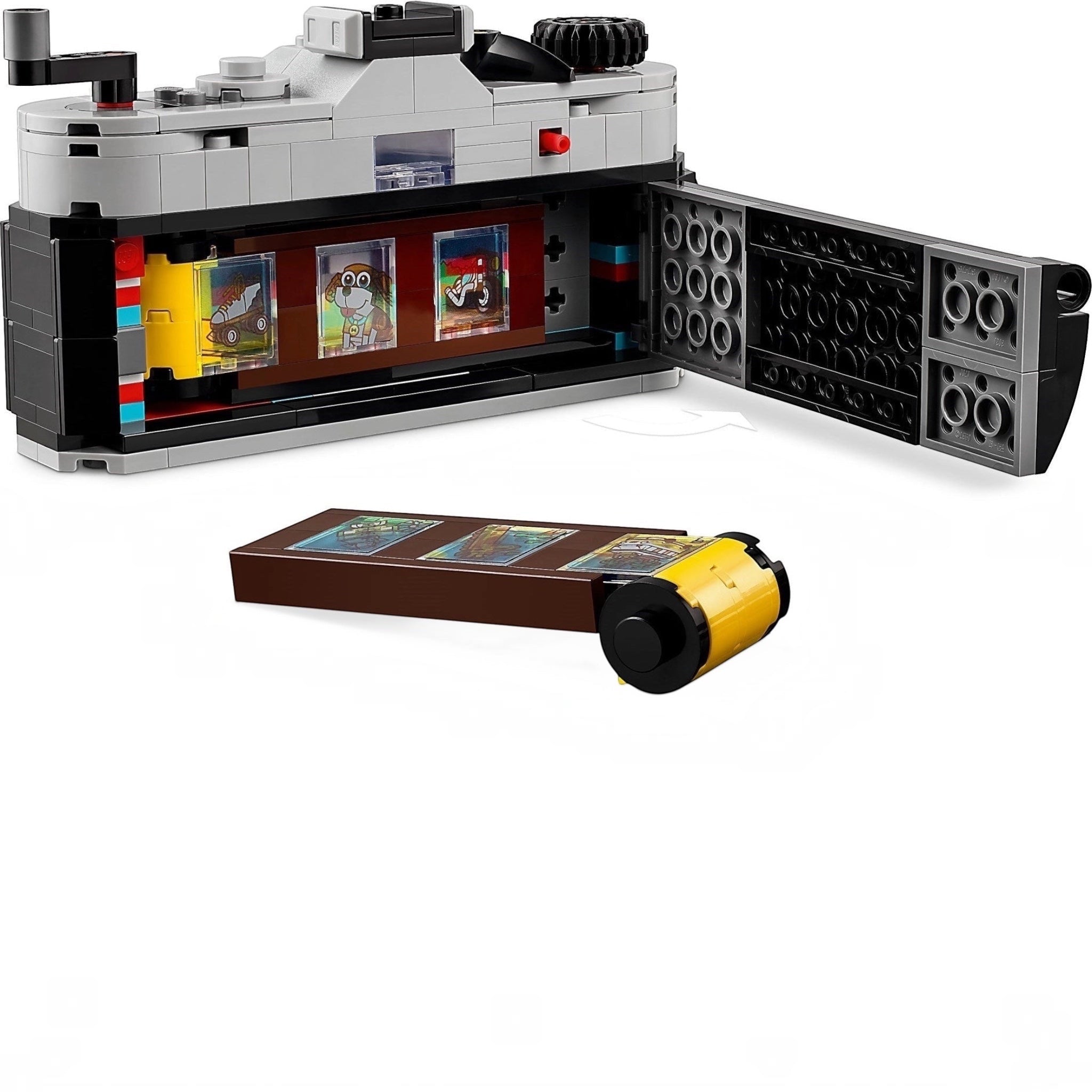 LEGO set with a camera model and open display case on a white background