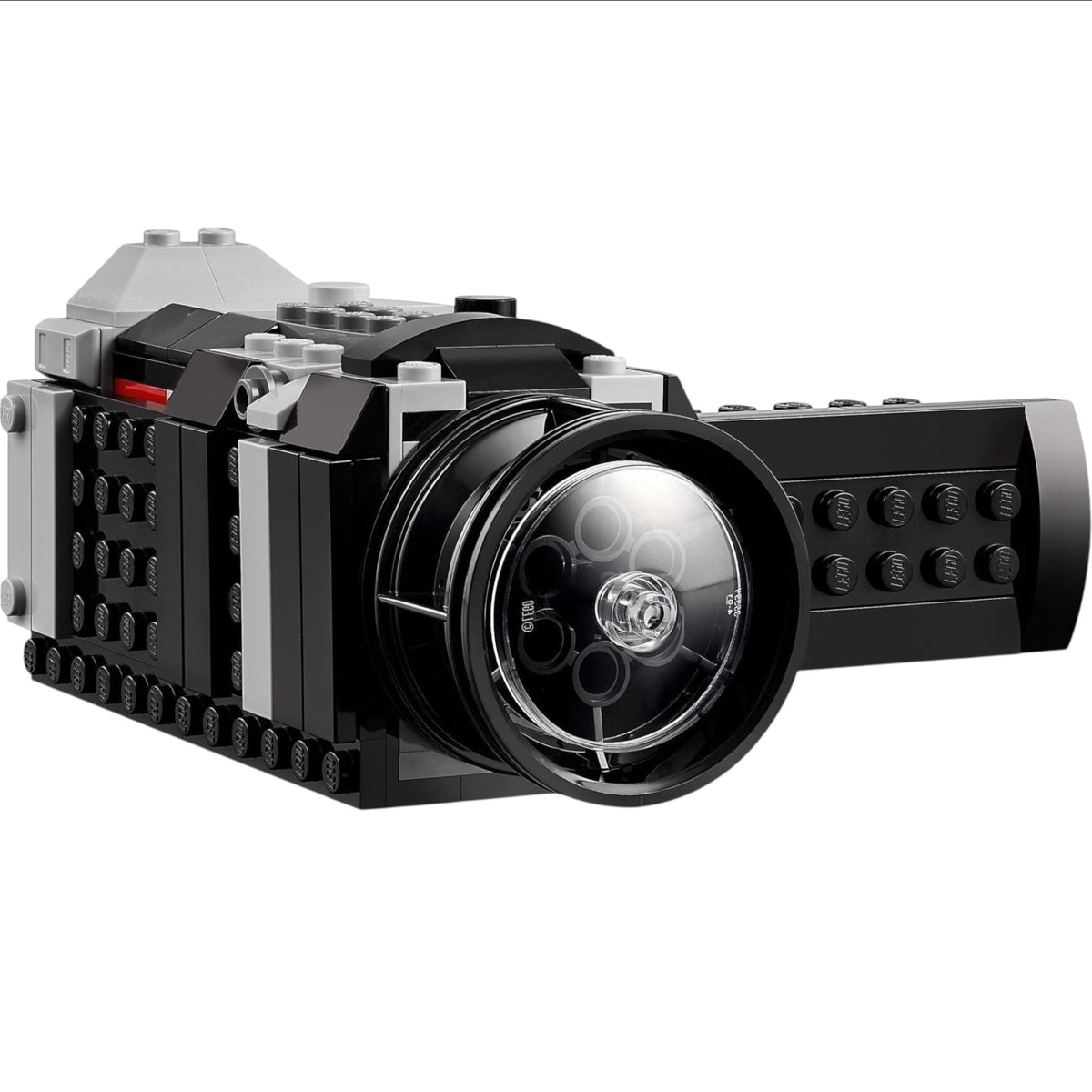[built-detail] Toy camera made of interlocking bricks on a white background