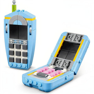 Toy phone model made of interlocking bricks on a white background