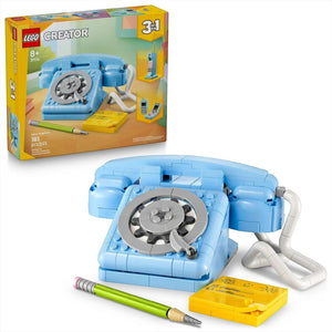 [box-set] LEGO Creator set of a blue telephone with packaging in the background